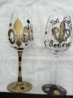 New Orleans Saints cups, wine glasses, stainless to go container.